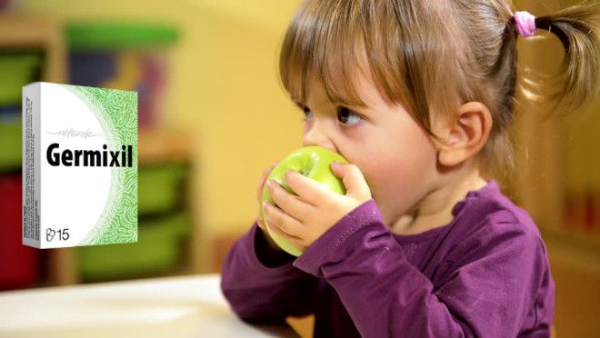 Germixil - child eating an apple